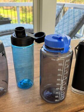 Collection of Water Bottles (CamelBak, Nalgene, GSI, ProMixx)